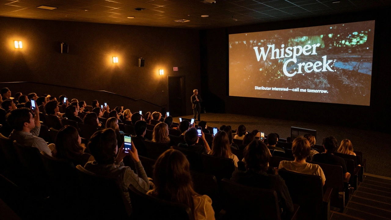 Filmmaker watching an audience react to their film at a festival premiere.