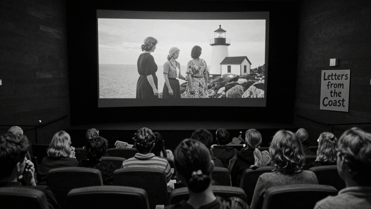 An audience watches a silent lighthouse film in a small Vermont theater, tears glistening in the screen's glow.