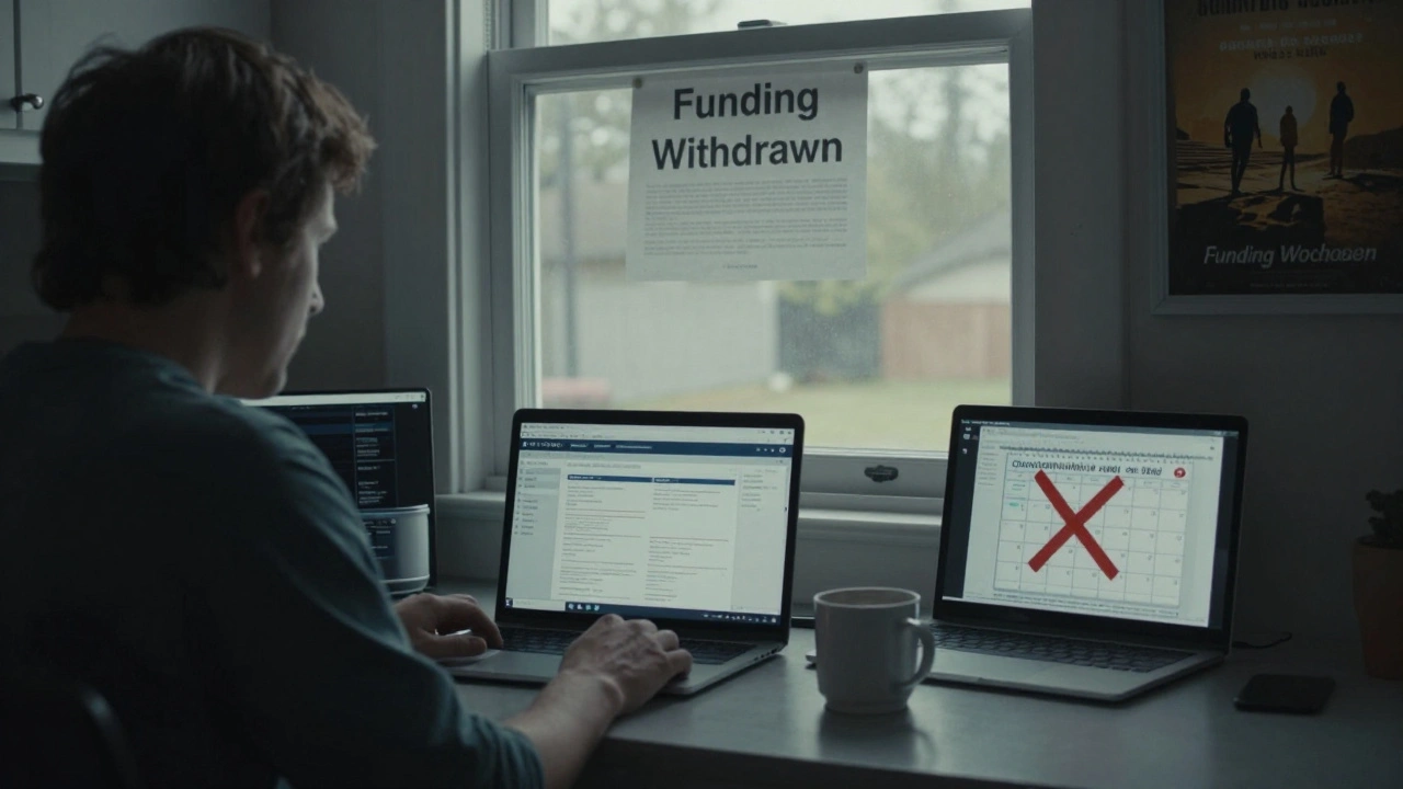 Indie filmmaker at a kitchen table surrounded by financial stress and a canceled release date.