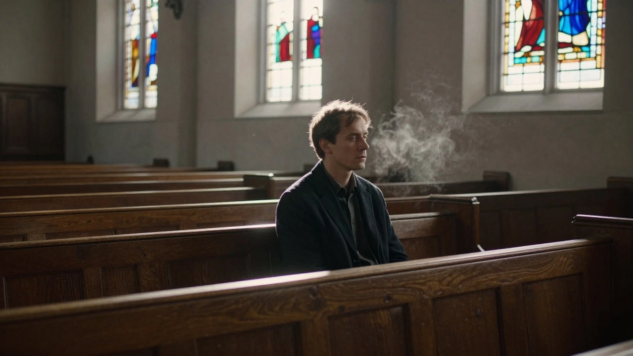 A man sits alone in an empty church, lit by cold sunlight through stained glass, lost in quiet contemplation.
