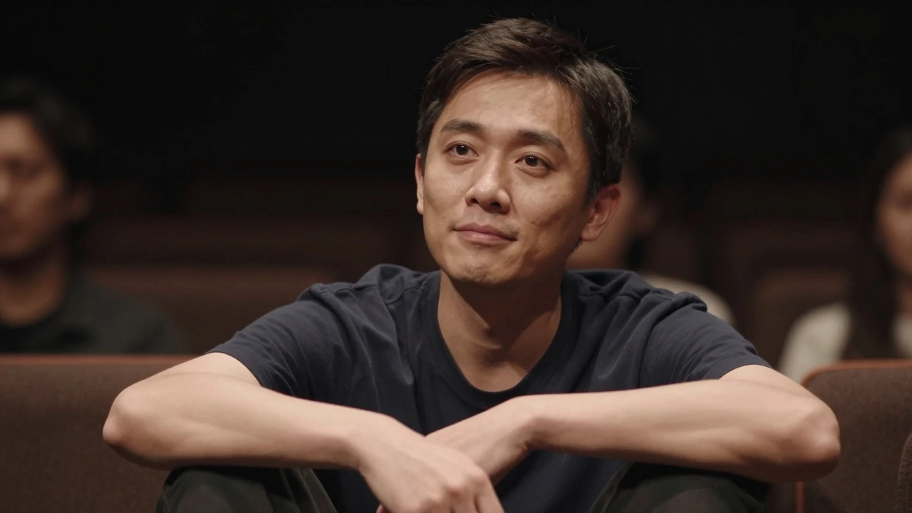 Close-up of a confident filmmaker making eye contact with the audience during a panel discussion.