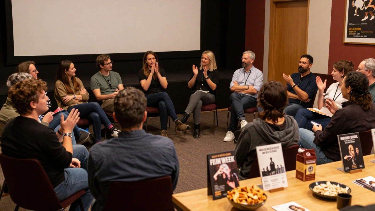 Diverse crowd engaging in lively discussion after a local film screening event